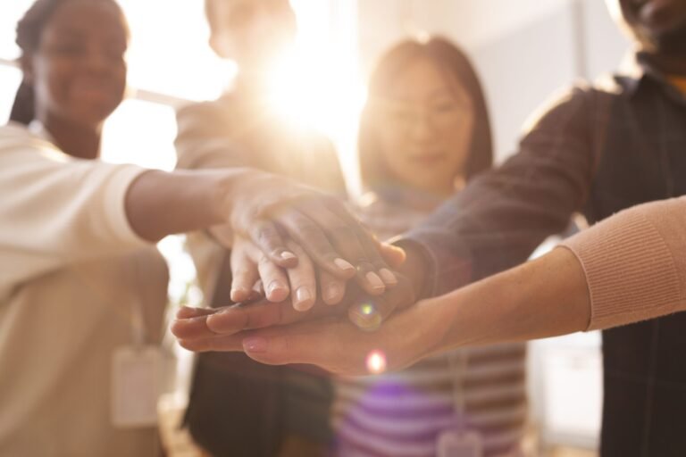 volunteers-teaming-up-organize-donations-charity-scaled-1 Image description
